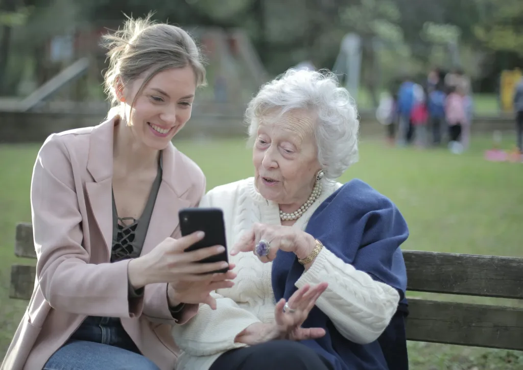 Senior enjoying care from younger generation and technology!